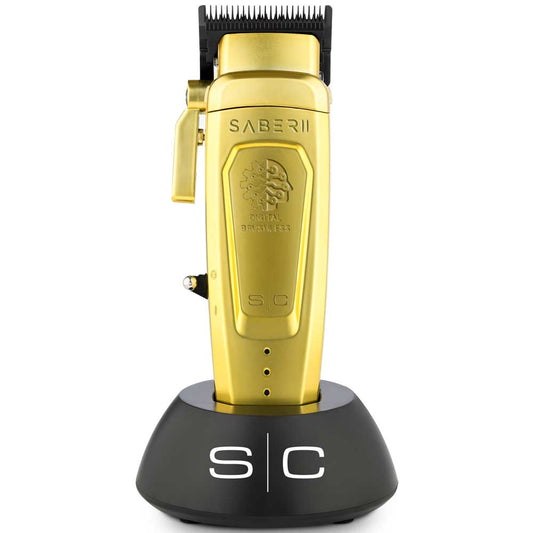 Gold hair clipper with black base on a white background