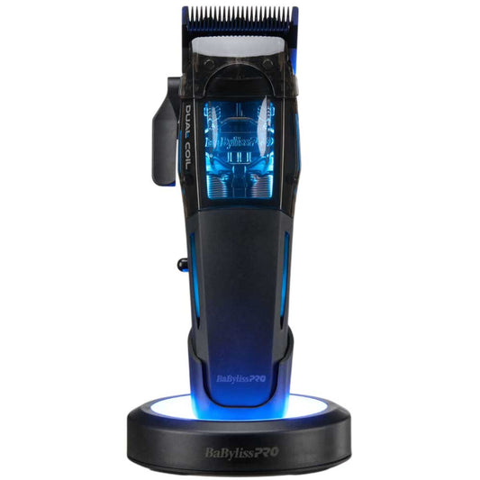 BaBylissPRO FX95C Dual-Coil Motor Clipper on a blue LED charging base with transparent housing