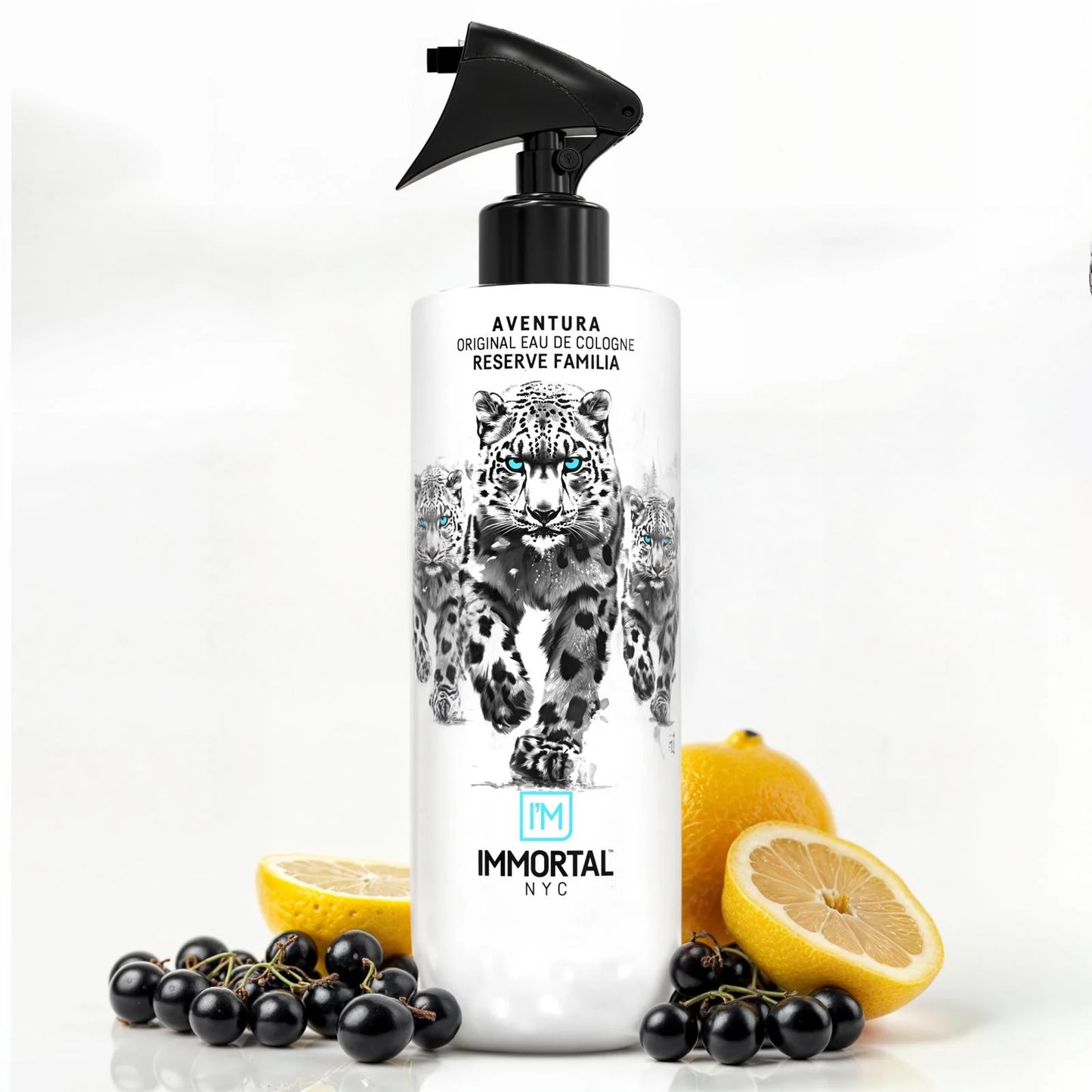 Aventura cologne bottle with lemons and black berries on a white background