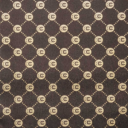 Dark brown textured fabric with a repeating gold monogram pattern of interlocking PC circles connected by dotted lines.