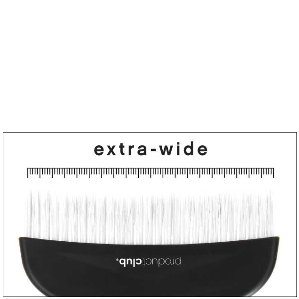 A close-up of an extra-wide eyelash extension brush with a black handle and white synthetic lashes, shown against a white background with a measurement ruler printed above.