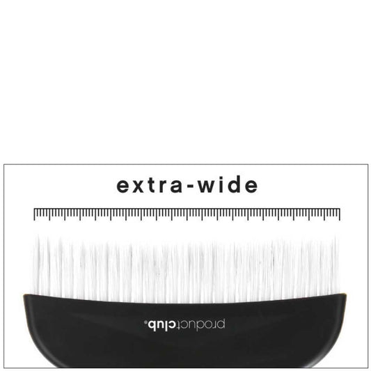 A close-up of an extra-wide eyelash extension brush with a black handle and white synthetic lashes, shown against a white background with a measurement ruler printed above.