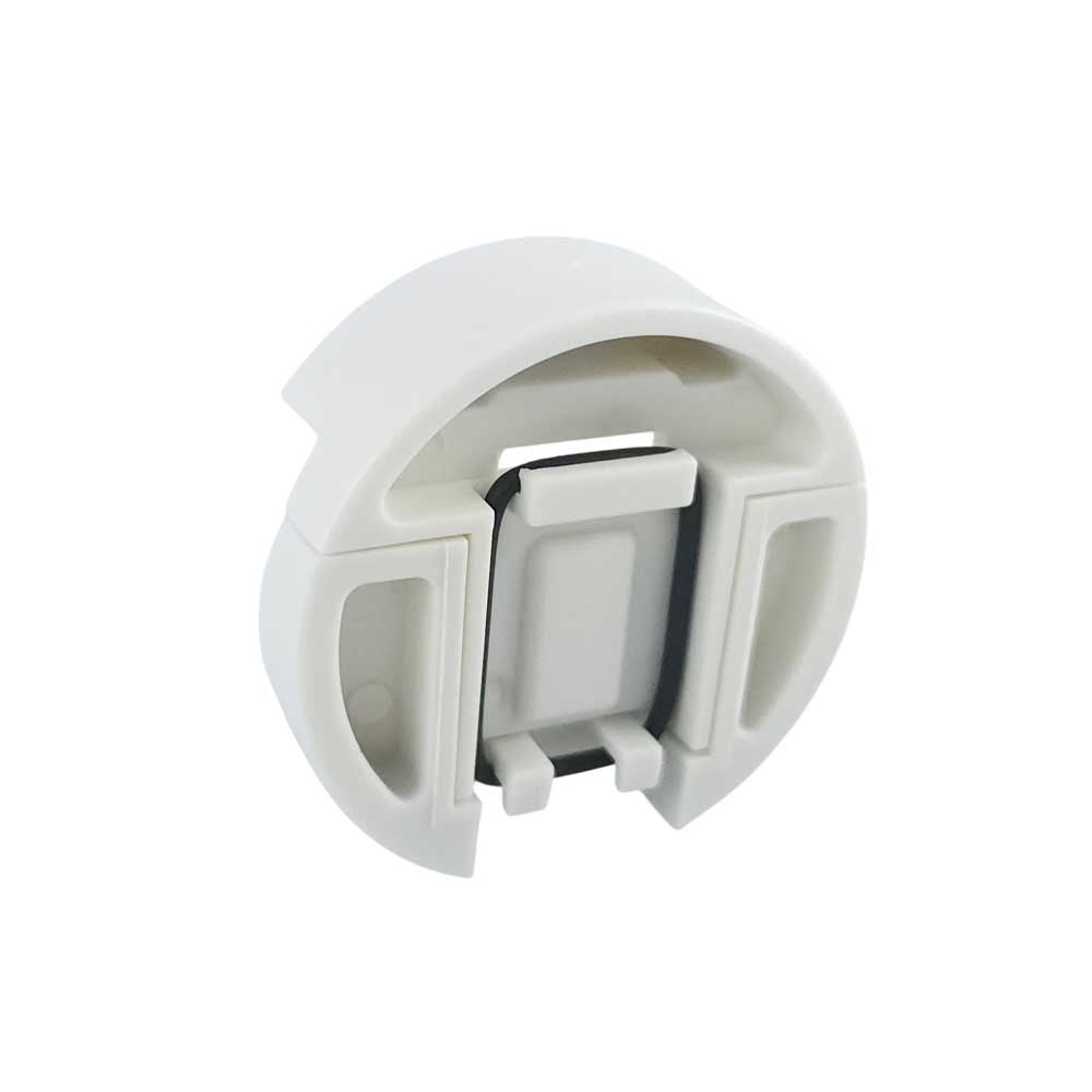 Gamma+ Zero Gap Universal Blade Setter tool in white, rear view showing a close-up of the back mechanism, white plastic clip component with a hinged center section on a plain white background