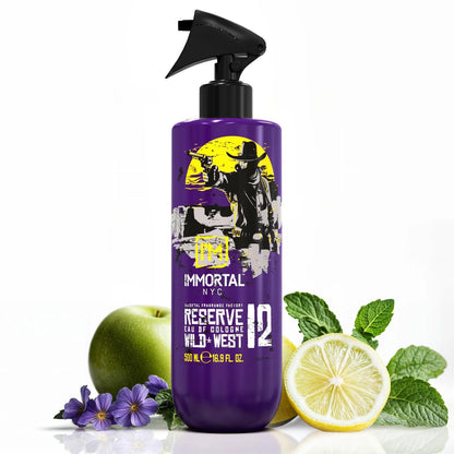Purple bottle with black cap on a white background, surrounded by green apple, lemon, and mint leaves.