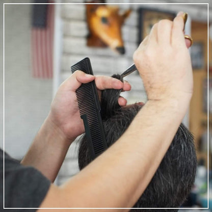 A professional Wahl Large Styling Comb showcasing a unique two-in-one design, featuring widely spaced, durable teeth on the top half for effortless hair sectioning, and fine, densely packed teeth on the bottom half for tight control and detailed clipper work. | BeauBar Supply