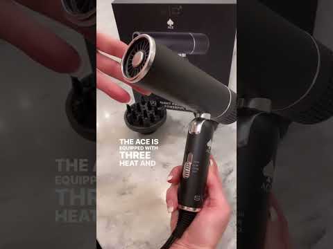 Hand holding StyleCraft Ace - Foldable, Lightweight, Portable Hair Dryer